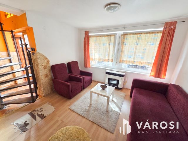 Hangulatos házikó zöld övezetben